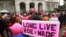 FILE - Pat Thompson displayed a sign supporting Roe v. Wade at a rally, held by Planned Parenthood, commemorating the 45th anniversary of the landmark Supreme Court decision at the Capitol, Jan. 22, 2018, in Sacramento, California. 