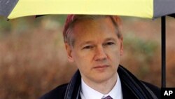 WikiLeaks founder Julian Assange arrives at Belmarsh Magistrates' Court in London, February 11, 2011