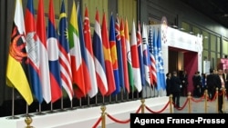 FILE - Member country flags of the Association of Southeast Asian Nations (ASEAN) are displayed at the group's summit in Bangkok, Thailand, Nov. 4, 2019. 