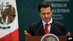 Mexico's President Enrique Pena Nieto speaks during a press conference at Los Pinos presidential residence in Mexico City, Jan. 23, 2017.