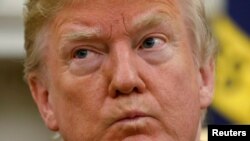 U.S. President Donald Trump listens during his meeting with Japanese Prime Minister Shinzo Abe at the White House in Washington, June 7, 2018. 