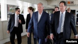 U.S. diplomat Tom Shannon (C) talks with Lee McClenny, Charge d'Affaires of the U.S. Embassy in Caracas, upon his arrival at Simon Bolivar Airport in Caracas, Venezuela, June 21, 2016. 