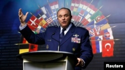 FILE - NATO Supreme Allied Commander Europe, U.S. General Philip Breedlove, speaks during a news conference in Ottawa, Canada, May 6, 2014. 