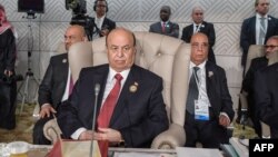 Yemeni President Abd-Rabbu Mansour Hadi attends the opening session of the 30th Arab League summit in the Tunisian capital of Tunis on March 31, 2019.