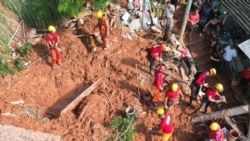 Foto dari udara menunjukkan tim penyelamat bekerja di lokasi tanh longsor di wilayah Bethania, Ipatinga, negara bagian Minas Gerais, Brasil, pada 12 Januari 2025. (Foto: AFP/Nilmar Lage)