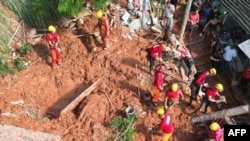 An aerial view shows rescue teams working at a landslide site in Bethania neighborhood, Ipatinga, Minas Gerais state, Brazil, Jan. 12, 2025.