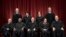FILE - The justices of the U.S. Supreme Court gather for a formal group portrait at the Supreme Court Building in Washington, Nov. 30, 2018.