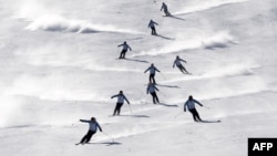 North and South Korean skiers take part in a joint training session at the Masikryong ski resort, near North Korea's east coast port city of Wonsan on February 1, 2018. 