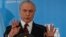 Brazil's President Michel Temer talks to press during a joint news conference at the government's official residence in Buenos Aires, Argentina, Oct. 3, 2016. 