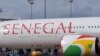 FILE — This illustration picture taken on November 15, 2019 shows the logo of the Air Senegal Airbus A330-900 aircraft parked on the tarmac of the Airbus delivery center in Colomiers, southwestern France. 