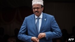 Somalia's President Mohamed Abdullahi Farmajo walks to make his speech during the inauguration ceremony of Djibouti International Free Trade Zone in Djibouti on July 5, 2018.