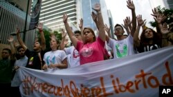 Students hold an anti-government protest to mark the third anniversary since the killing of student protester Bassil da Costa by security forces during weeks of unrest in Caracas, Venezuela, Feb. 12, 2017.