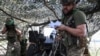 Artillerymen of the National Guard of Ukraine fire a M101A1 howitzer towards Russian troops at a front line near Pokrovsk, Donetsk region, Ukraine, Sept. 5, 2024. (Radio Free Europe/Radio Liberty/Serhii Nuzhnenko via Reuters)