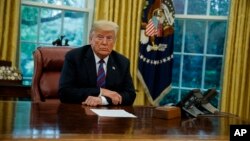 President Donald Trump listens during a phone call with Mexican President Enrique Pena Nieto about a trade agreement between the United States and Mexico, in the Oval Office of the White House, Aug. 27, 2018, in Washington. 