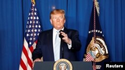 FILE - U.S. President Donald Trump delivers remarks in West Palm Beach, Fla., Jan. 3, 2020, following the U.S. military airstrike against Iran's Qassem Soleimani in Baghdad, Iraq.