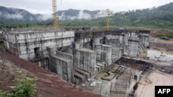 FILE - The regulating dam of the Nam Theun 2 power dam under construction is pictured in this 28 June 2007 photo, in Lao's Nakai plateau. 