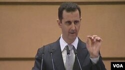 Presiden Suriah Bashar al-Assad berpidato di Universitas Damaskus (10/1).