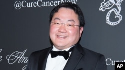 FILE - Jho Low, a Malaysian financier, attends an event in New York, Oct. 20, 2014.