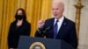 FILE - President Joe Biden speaks in the East Room of the White House as Vice President Kamala Harris listens, in Washington, May 10, 2021.