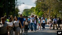 Cubans wait their turn to enter Panama's embassy to apply for travel visas to Panama, in Havana, Cuba, April 26, 2019. 