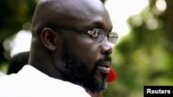 George Weah in Monrovia, November 2011 file photo. 