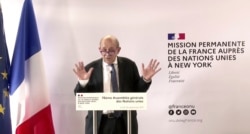 In this photo taken from video, France's Foreign Minister Jean-Yves Le Drian speaks during a news conference, Sept. 20, 2021, in New York.
