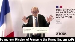 In this photo taken from video, France's Foreign Minister Jean-Yves Le Drian speaks during a news conference, Sept. 20, 2021, in New York. 