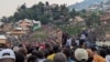 FILE - Congolese volunteers and former rebels gather in a rally to mobilize against the possible invasion by M23 rebels in Bukavu on Jan. 30, 2025