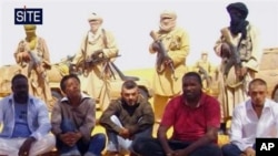 Images of a group of foreign hostages working for a French energy company who were seized in Niger (file)