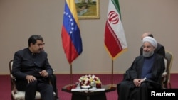 El presidente de Venezuela, Nicolás Maduro, se reúne con Hassan Rouhani, presidente de la República Islámica de Irán, en Astana, Kazajstán, el 10 de septiembre de 2017.