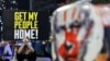 A demonstrator raises a placard during an protest calling for action to secure the release of Israelis held hostage in Gaza since the October 2023, in front of the Israeli defence ministry in Tel Aviv on January 14, 2025, amid the ongoing war between Isra