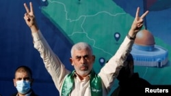 FILE - Hamas leader Yahya Sinwar gestures during an anti-Israel rally in Gaza City on May 24, 2021. Israeli forces killed Sinwar, the mastermind behind Hamas' October 7 terror attack on Israel that sparked the Gaza war, on Oct. 17, 2024.