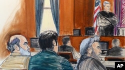 In this courtroom sketch, Sulaiman Abu Ghaith, left, listens as U.S. District Judge Lewis A. Kaplan stands to speak, March 3, 2014, during jury selection at the start of Abu Ghaith's trial in New York.