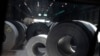 FILE - In this June 28, 2018, file photo, rolls of finished steel are seen at the U.S. Steel Granite City Works facility in Granite City, Ill. 