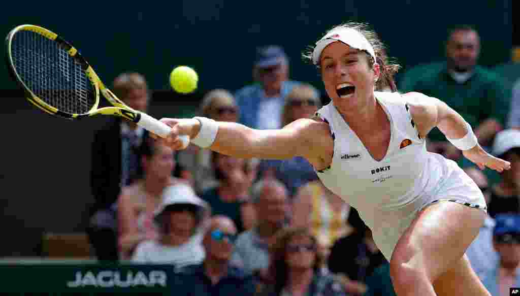 Britain's Johanna Konta returns to Czech Republic's Petra Kvitova in a Women's singles match during day seven of the Wimbledon Tennis Championships in London.
