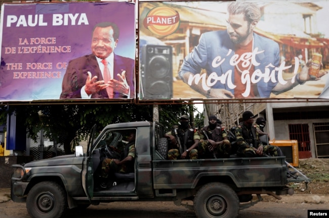 Cameroonian elite Rapid Intervention Battalion (BIR) members patrol in the south west city of Buea, Cameroon, Oct. 5, 2018.