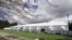One of a pair of massive temporary buildings meant for use as a field hospital for coronavirus patients stands on a soccer field in the Seattle suburb of Shoreline, Washington, March 24, 2020.