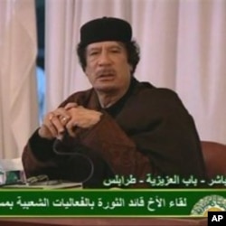 This image taken from Libya State TV shows Libyan leader Moammar Gadhafi, March 15, 2011