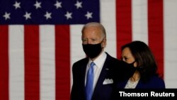 El candidato demócrata a la presidencia, Joe Biden, junto a la candidata a la vicepresidencia, Kamala Harris, durante su primer mitin de campaña juntos en Wilmington, Delaware. Agosto 12 de 2020. 