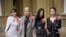 From left, Lisa (Lalisa Manoban), Rose (Roseanne Park), Jisoo Kim and Jennie Kim, from the K-Pop band Blackpink pose with their Honorary Members of the Order of the British Empire, awarded in recognition of the band's role as COP26 advocates in London, Nov. 22, 2023. 