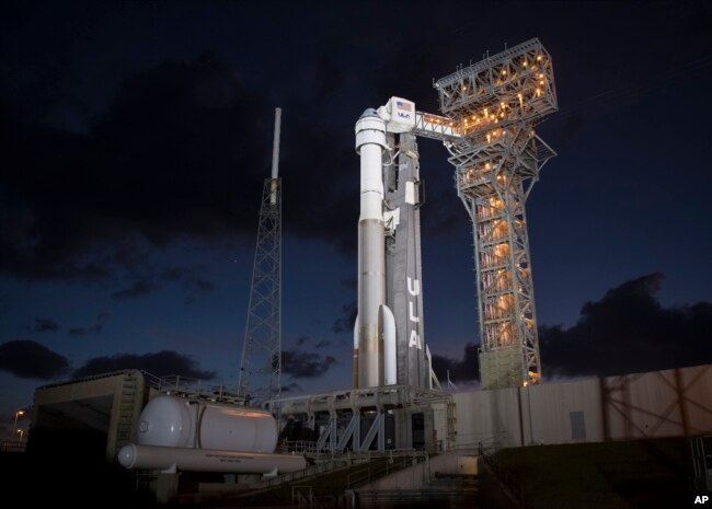 A United Launch Alliance Atlas V rocket with Boeing's CST-100 Starliner spacecraft onboard is seen on the launch pad at Space Launch Complex 41 ahead of the Orbital Flight Test mission, Wednesday, Dec. 18, 2019 at Cape Canaveral Air Force Station in Florida. (Image Credit: Joel Kowsky/NASA via AP)