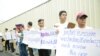 Security guards, terminated over allegations of sharing child pornography, and members of their families, protest in front of the U.S. Embassy in Phnom Penh, Cambodia, June 19 2018. (T. Malis/VOA Khmer)