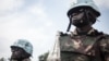 Des soldats tanzaniens de la mission de maintien de la paix de l'ONU en République centrafricaine (MINUSCA) patrouillent la ville de Gamboula, menacée par le groupe Siriri, le 6 juillet 2018.