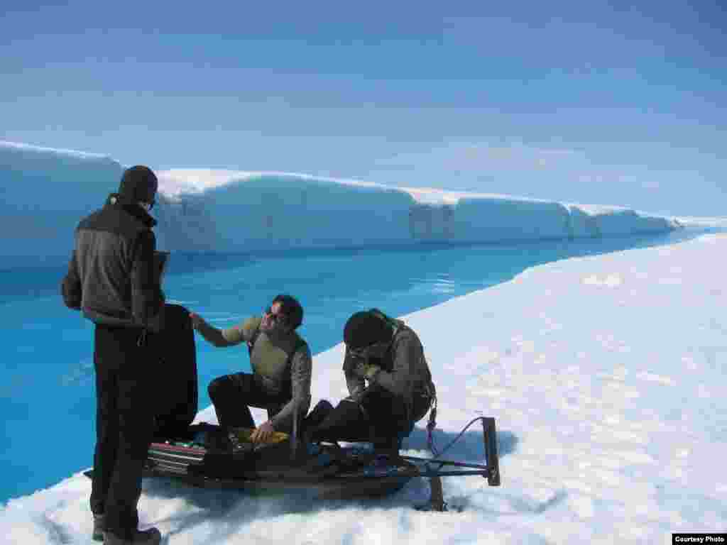 Meltwater drains from Greenland&rsquo;s ice sheet at such a fast rate that researchers couldn&rsquo;t risk entering the water to get readings so they used a remote-controlled drone boat. (UCLA/ Laurence C. Smith)