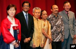 FILE - Lao civil society leader Sombath Somphone (3-L) is seen among Asian recipients of the Ramon Magsaysay awards, in Manila, Philippines, Aug. 31, 2005.