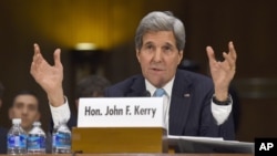 Secretary of State John Kerry testifies on Capitol Hill, Dec. 9, 2014, before the Senate Foreign Relations hearing on "Authorization for the Use of Military Force Against IS." 