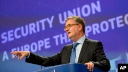 European Commissioner for Security Julian King speaks during a media conference at EU headquarters in Brussels on Oct. 18, 2017. 