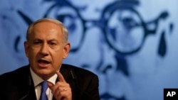 Israeli Prime Minister Benjamin Netanyahu delivers a speech to his Likud party members in Tel Aviv, Israel, Sunday, May 6, 2012. 