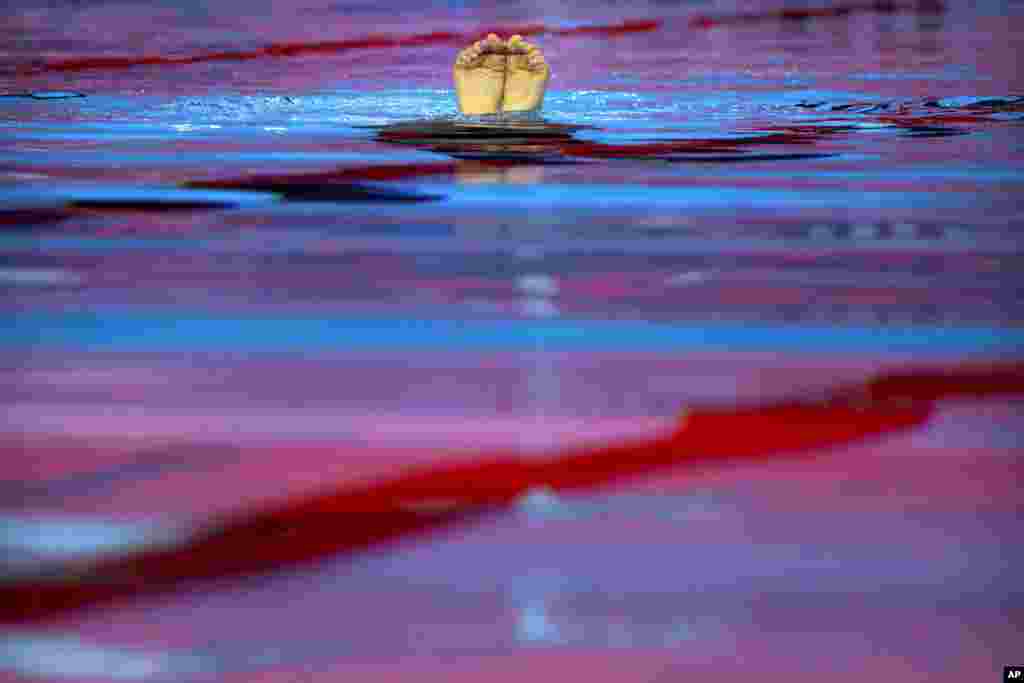 Defne Bakirci of Turkey competes in the preliminaries of solo technical artistic swimming at the World Swimming Championships in Gwangju, South Korea.