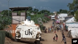 FILE - A U.N. armored personnel vehicle stands in a refugee camp in Juba, South Sudan, July 25, 2016.